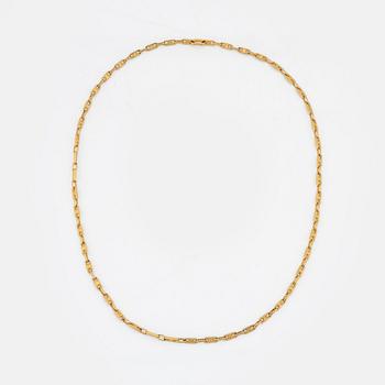 Céline, a gold tone chain.