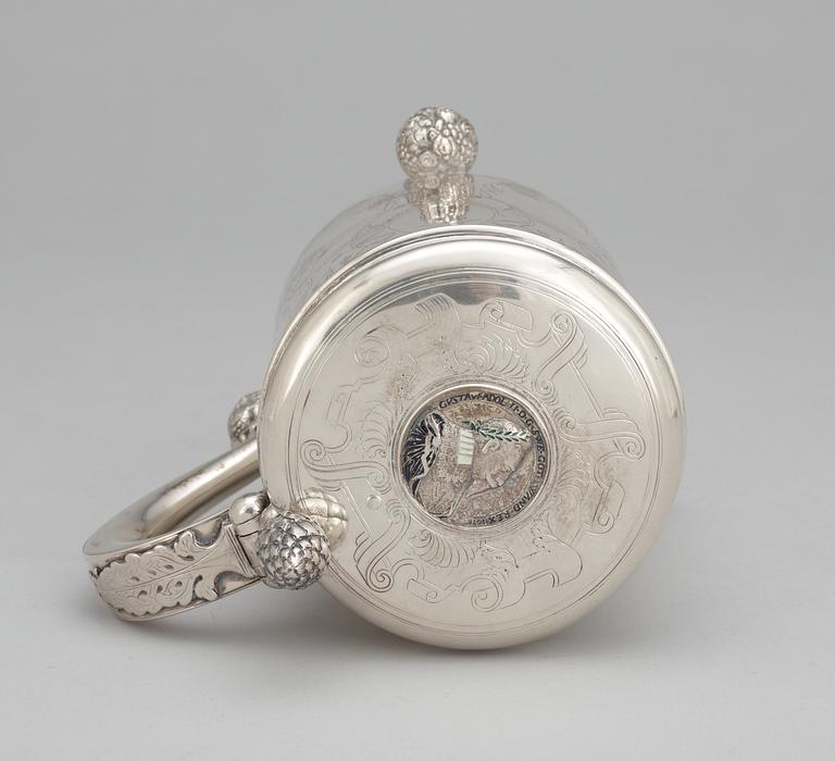 A Baroque style tankard with no silver marks.