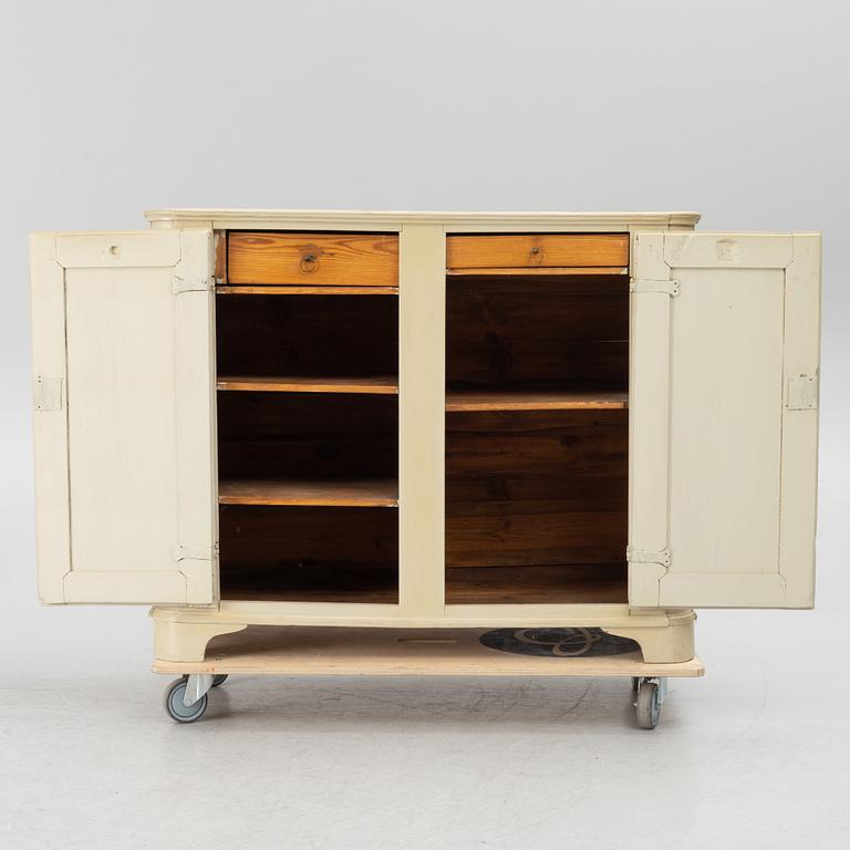 A Gustavian cupboard, early 19th century.