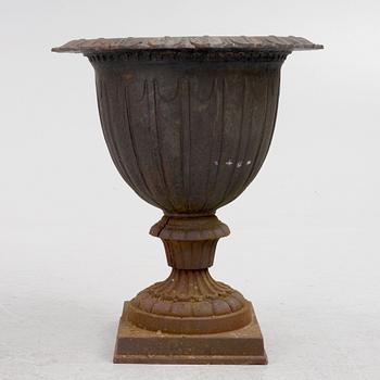 A cast iron palnter, 20th Century.