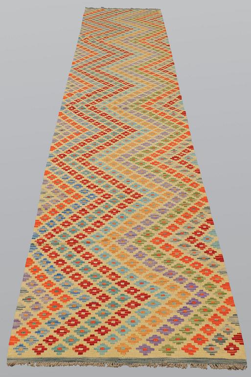 A runner, kilim, ca  484 x 84 cm.