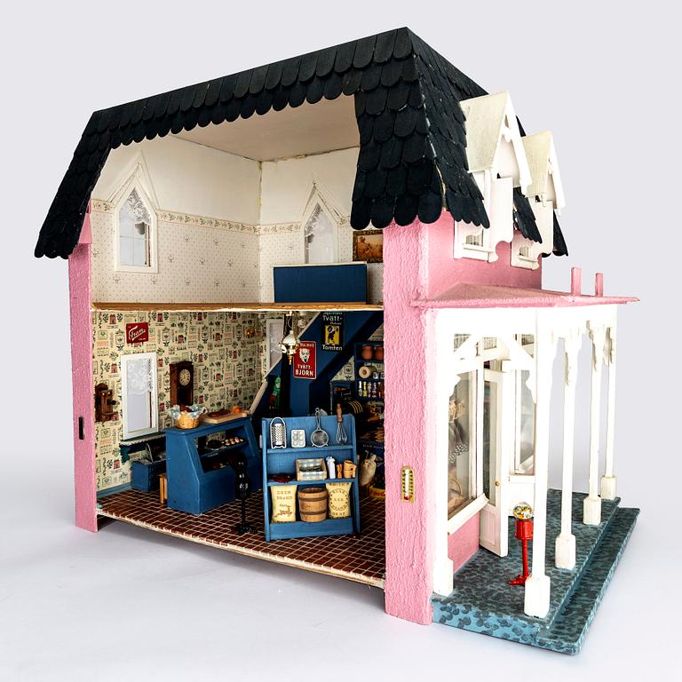 A handmade dolls house later part of the 20th century.