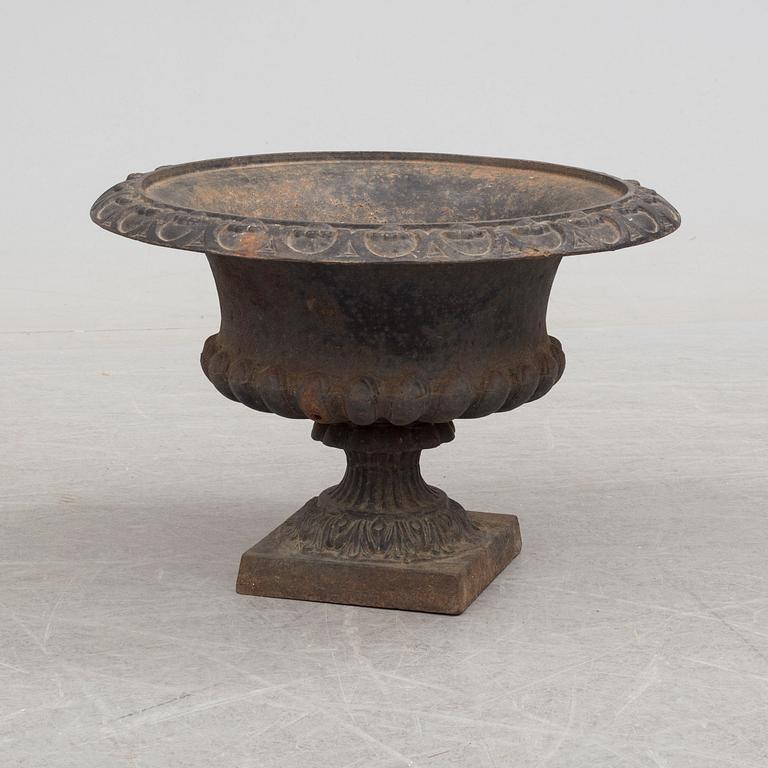 An early 20th century iron garden urn.