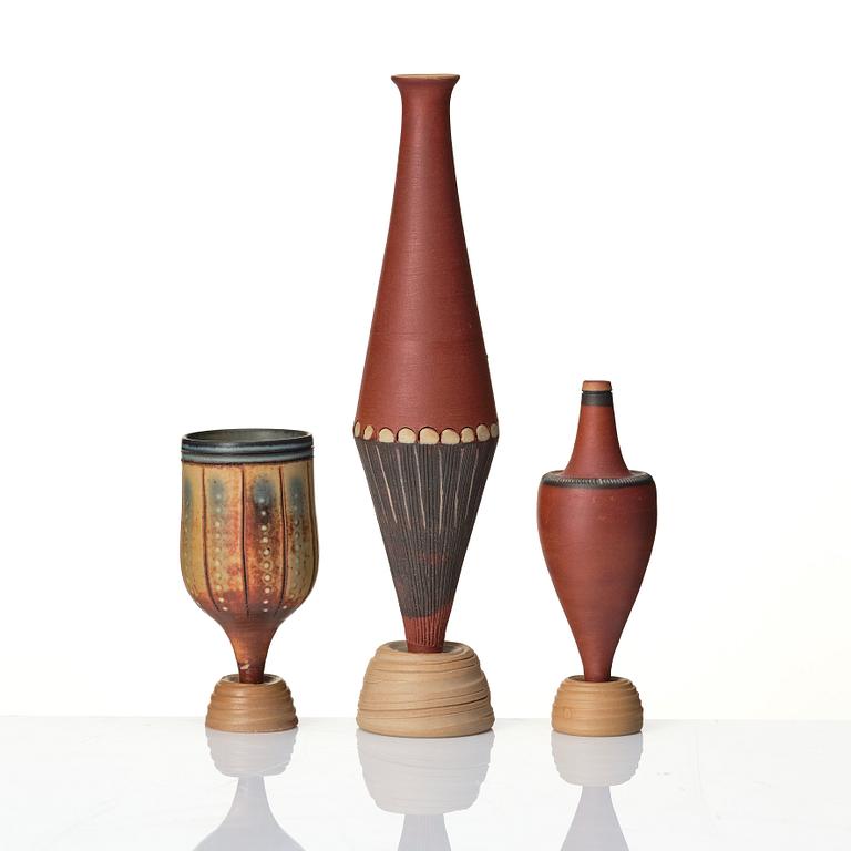 Wilhelm Kåge, a set of three miniature  'Farsta Spirea' stoneware vases, Gustavsberg studio, Sweden, one dated 1958.
