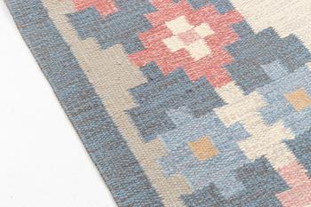A flat weave carpet, signed  ILS, Alestalon Mattokutomo, Kauhava, Finland, c.  230 x 158 cm.