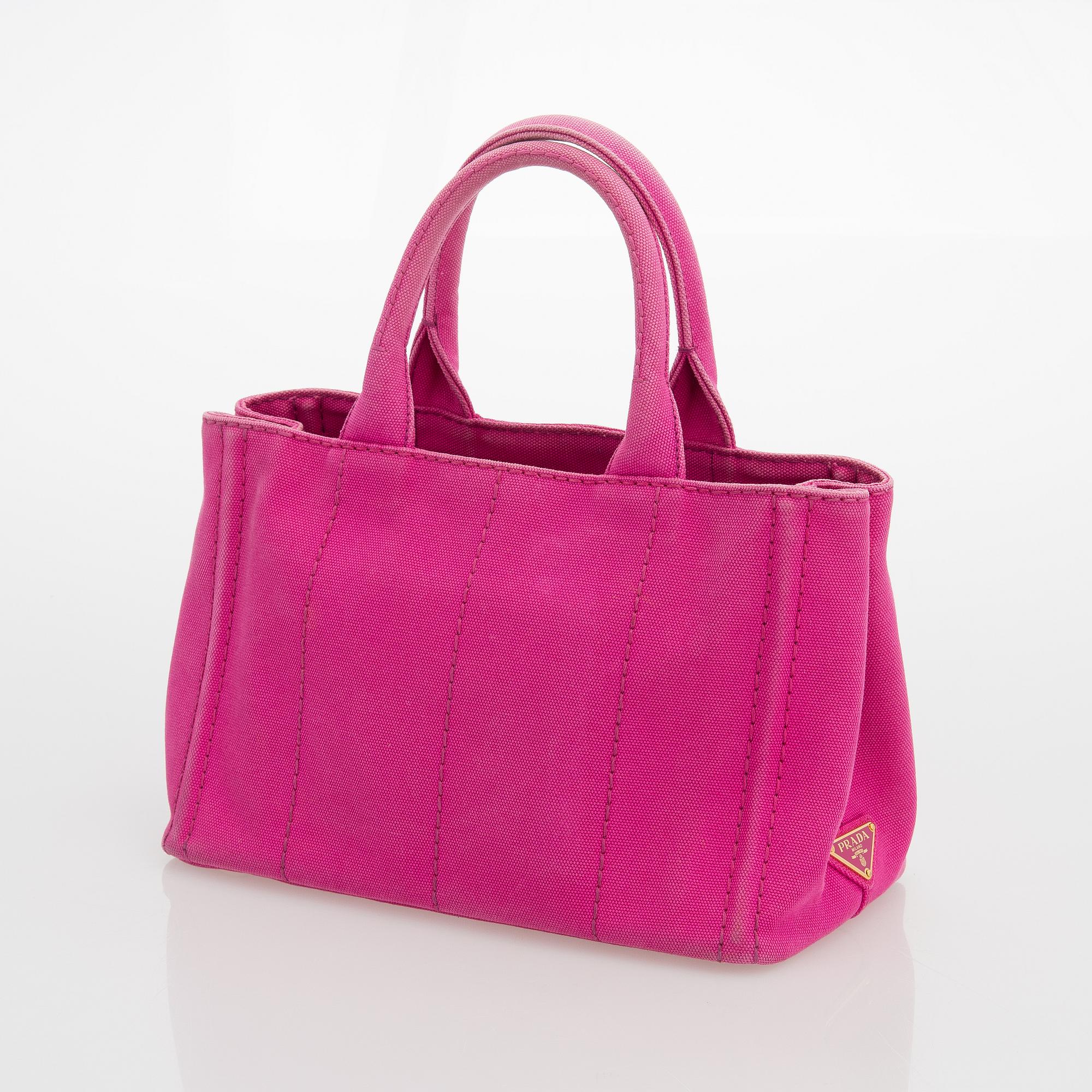Prada, a Canapa Canvas Gardener's Tote Bag.