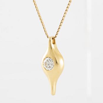 Pendant in 18K gold with a round brilliant-cut diamond.
