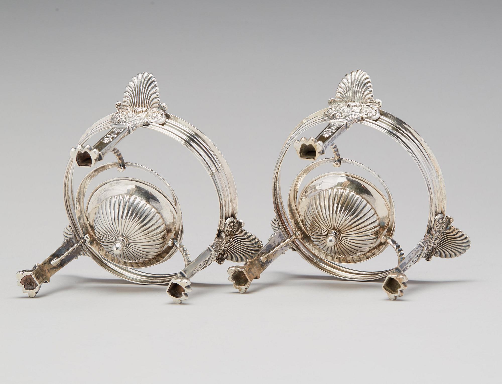 A pair of Swedish Empire silver tureens on stand, mark of Adolf Zethelius, Stockholm 1830.