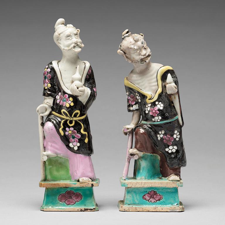 A pair of famille rose figures of 'Immortals', Qing dynasty, late 18th Century.