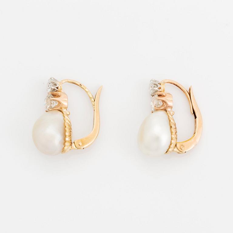 A pair of 18K gold and pearl earrings set with old-cut diamonds.