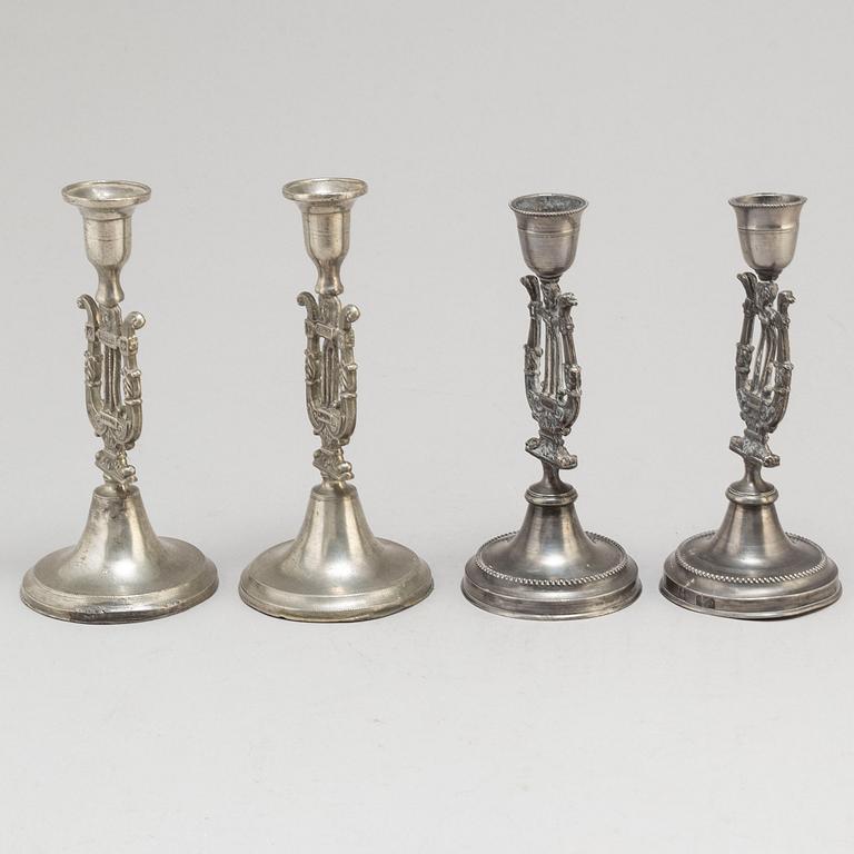Two pair of Swedish pewter candlesticks, early 19th century and ca 1900.