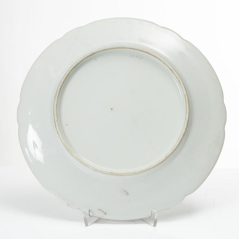 A group of three armorial dinner plates, presumably France, late 19th century.