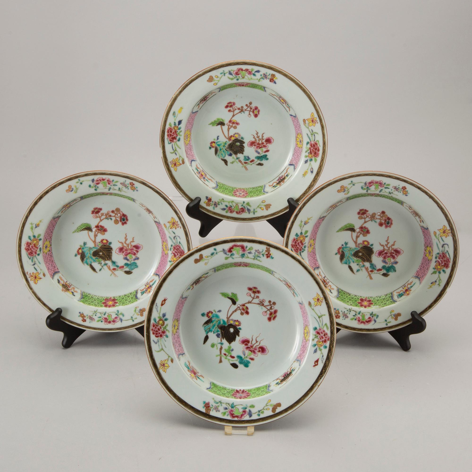 A set of four Chinese famille rose Qianlong porcelain plates.