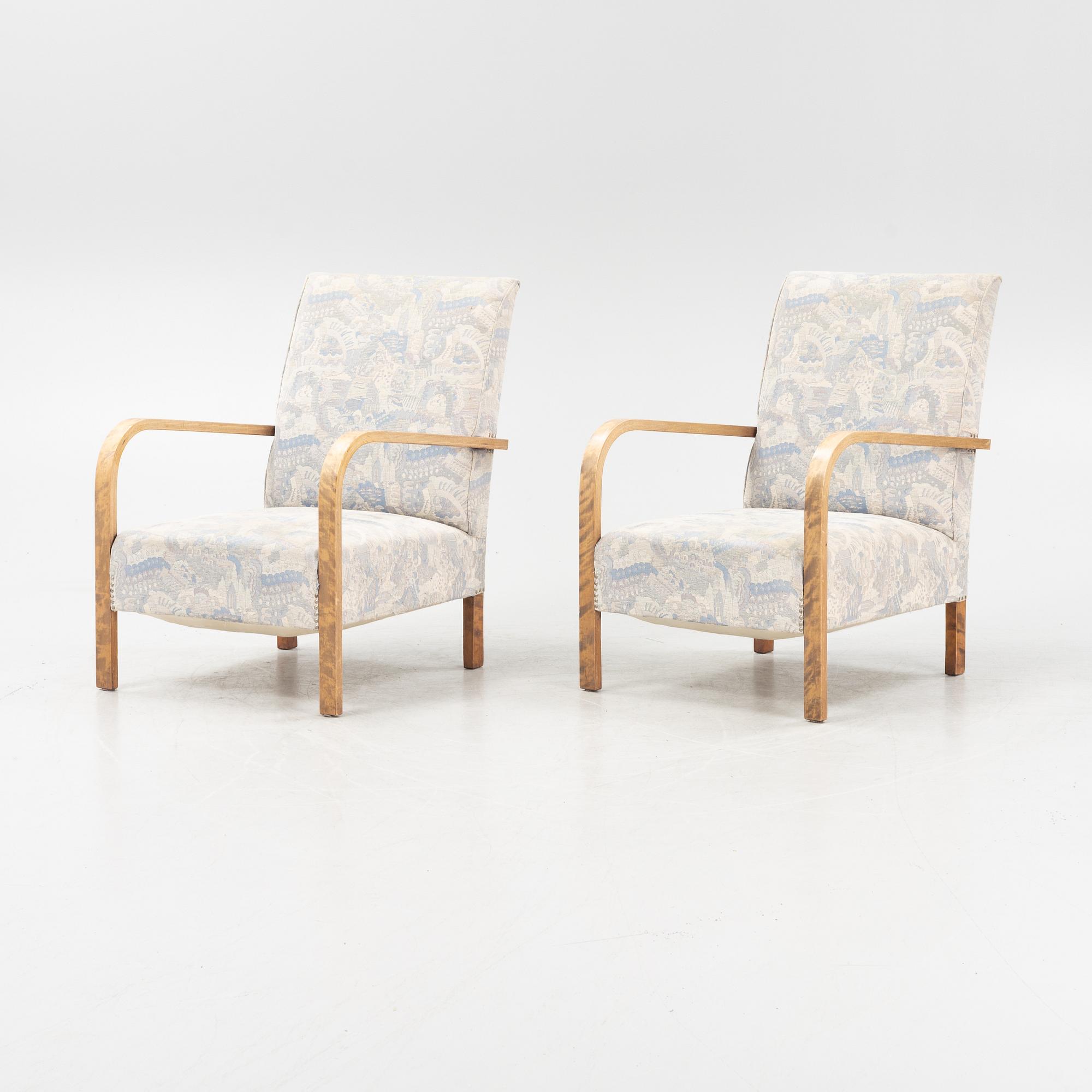 A pair of 1930's armchairs.