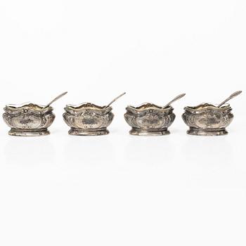 Four French silver salt cellars with spoons, mark of Oilier & Caron,  Paris, 1910-1936.