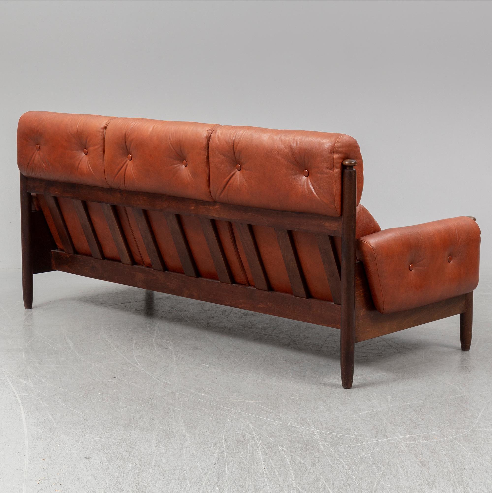 A 1960's/70's three-piece furniture suite.