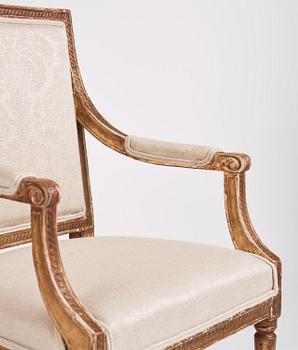 A near pair of Gustavian giltwood fauteuils, Stockholm, late 18th century.