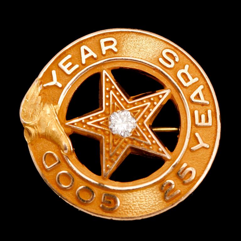 BROSCH, 10 k guld med liten briljant. Vikt ca 2 g.