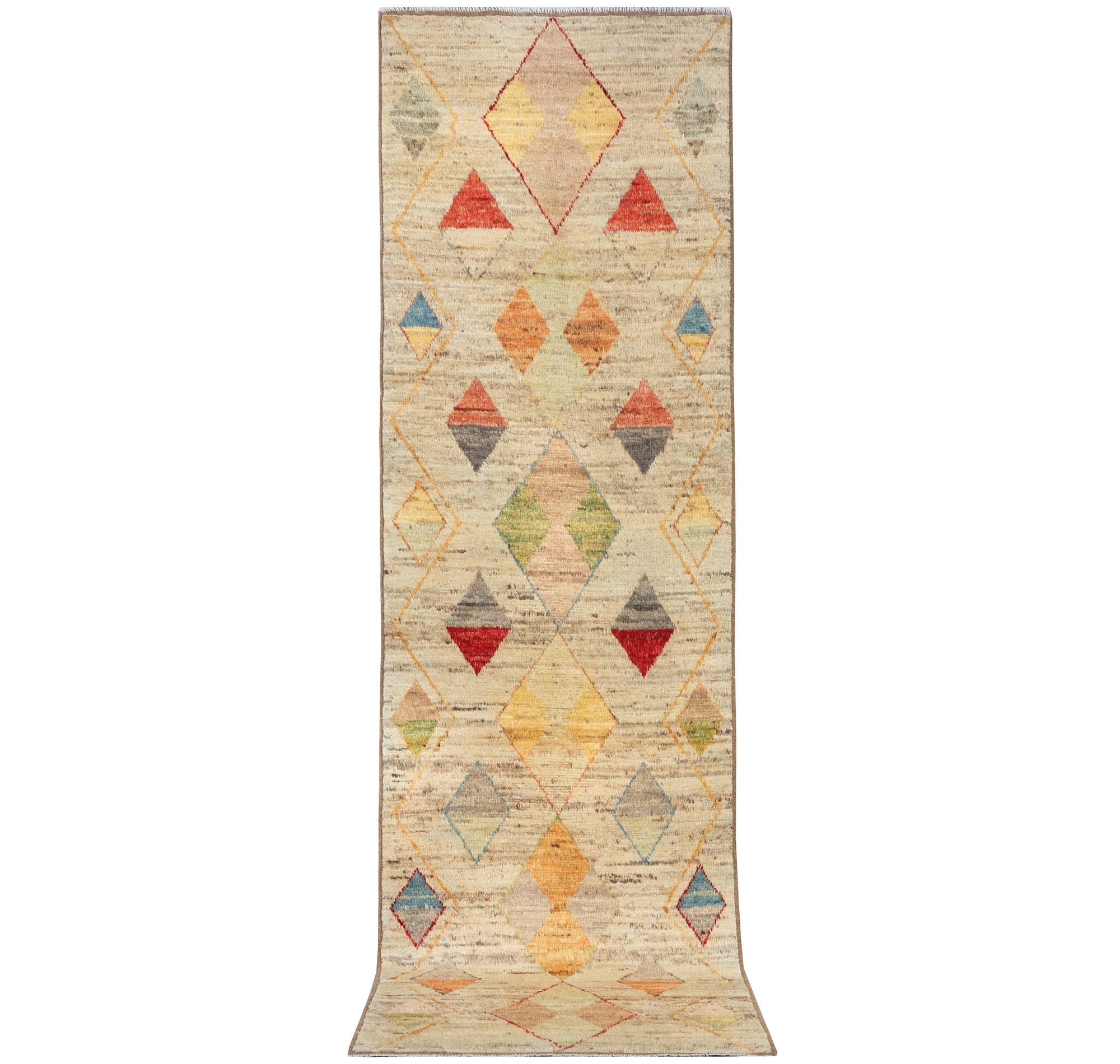 A runner carpet, Morocco, c. 392 x 101 cm.