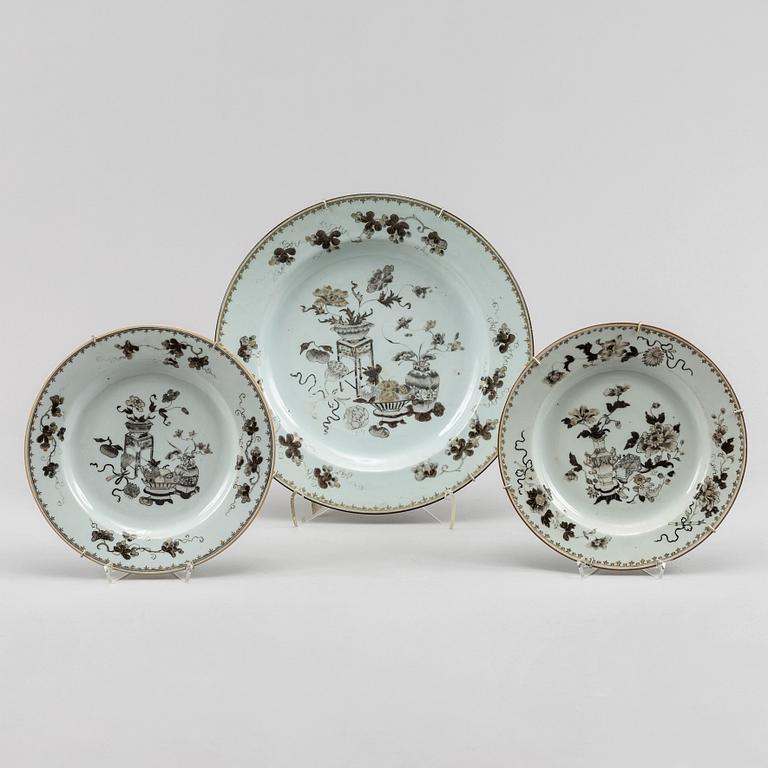 A grisaille dish and two plates, Qing dynasty, Qianlong (1736-95).