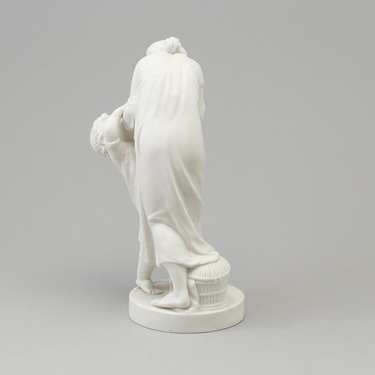 A biscuit figure of a woman and a boy, Gustafsberg, early 20th Century.