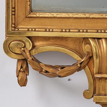 A Gustavian giltwood mirror, Stockholm, late 18th century.