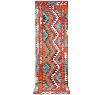 A Kilim runner carpet, c. 297 x 79 cm.