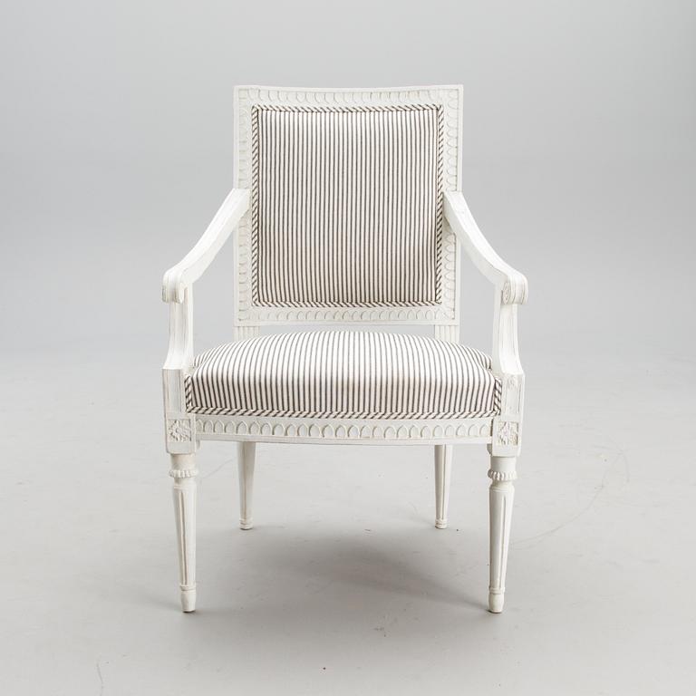 A late 18th century Swedidh Gustavian open arm chair.