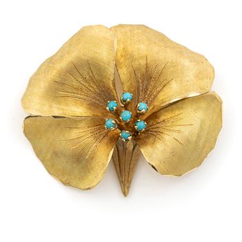 Brooch, 18K gold in the form of a flower with turquoise stones.