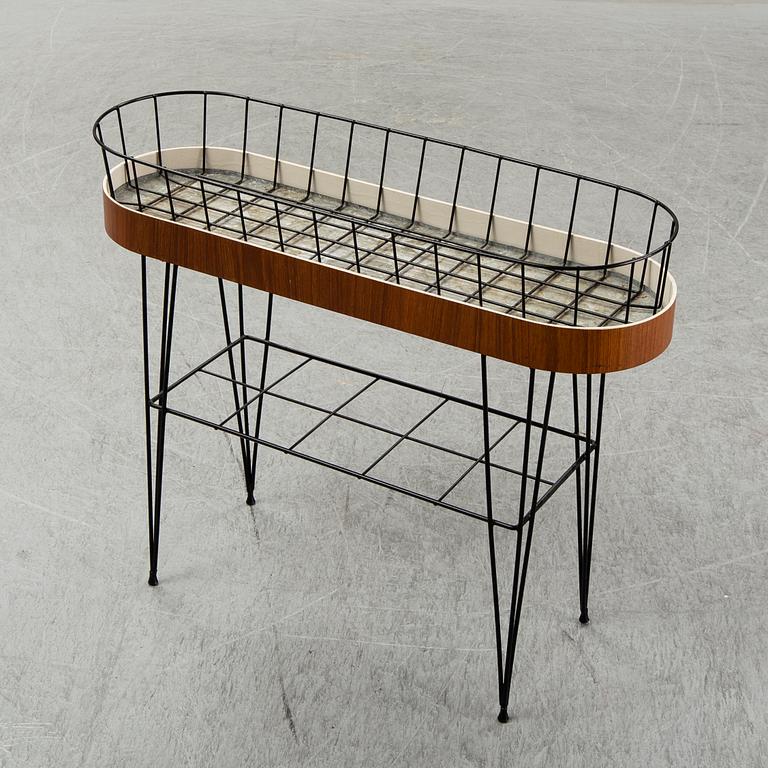A 1950-60s plant stand.