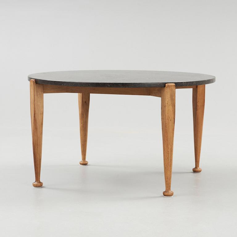 A Josef Frank black marble top table, walnut based, Svenskt Tenn, model 960.