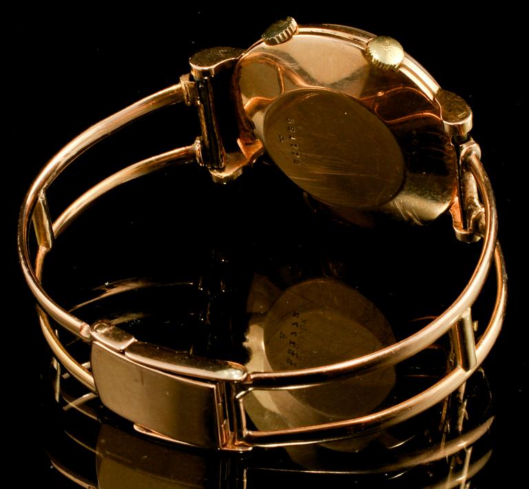 ARMBANDSUR, herr, 18 k guld, Jaeger LeCoultre, "Memovox". omkring 1900-talets mitt. Total vikt 56 g.
