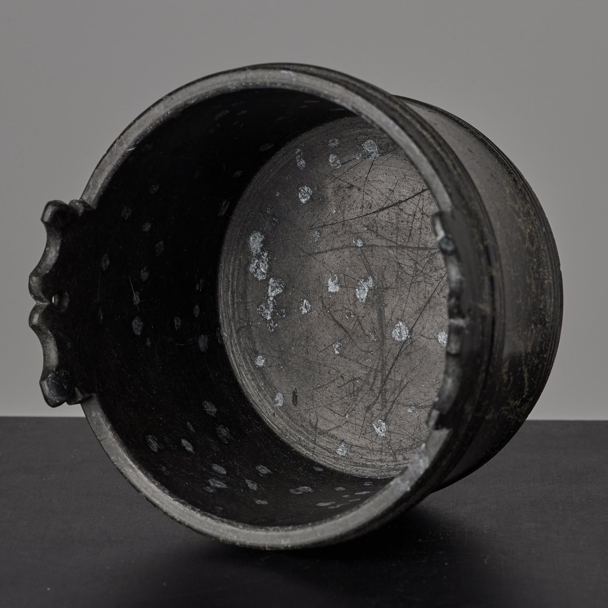 A serpentine stone butter box and cover circa 1800.