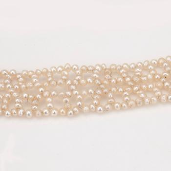 A natural seed pearl lace necklace.