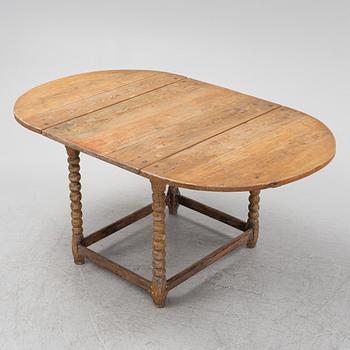 A pine gate-leg table, 18th/19th Century.