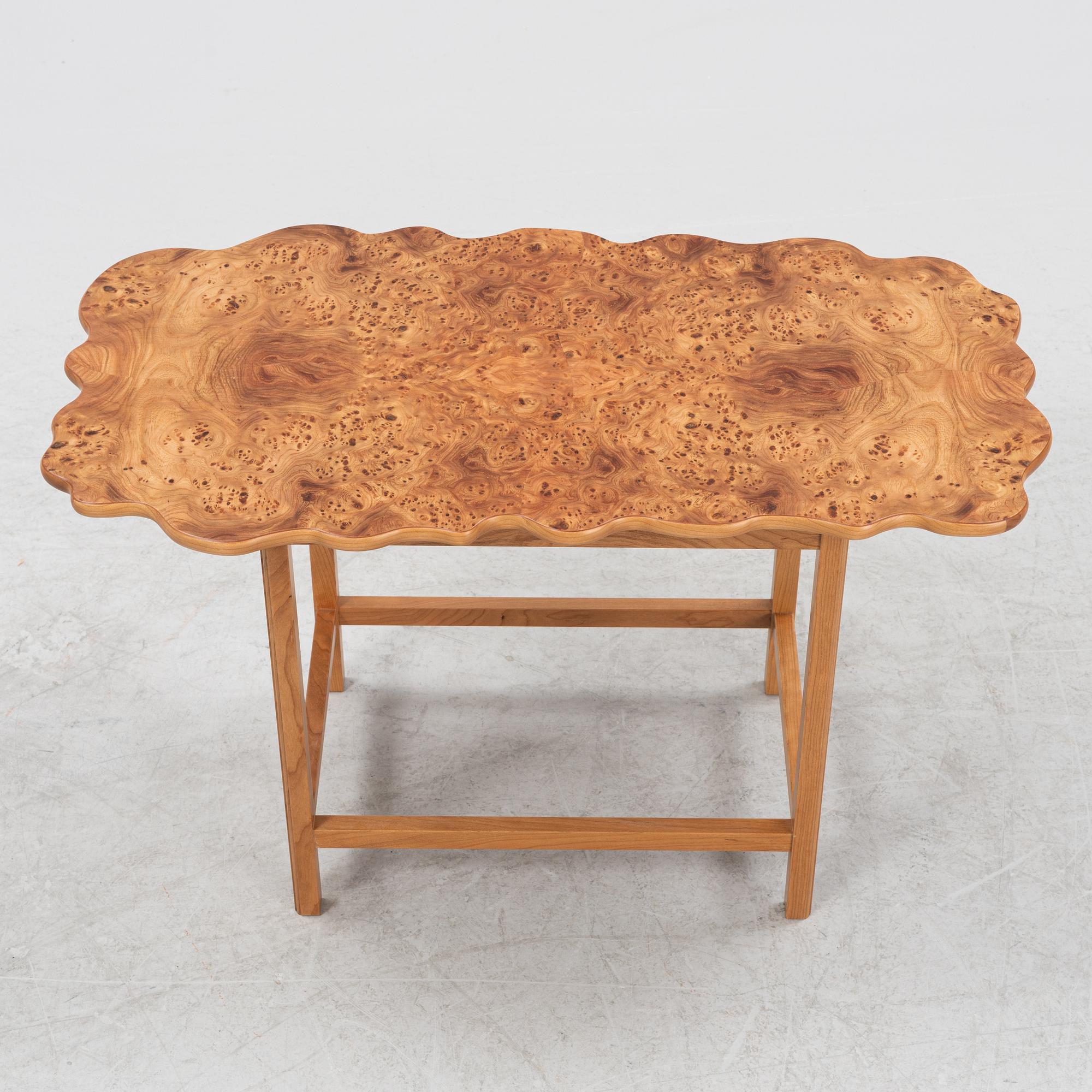 Josef Frank, an elm root top model 1058 coffee table from Firma Svenskt Tenn.
