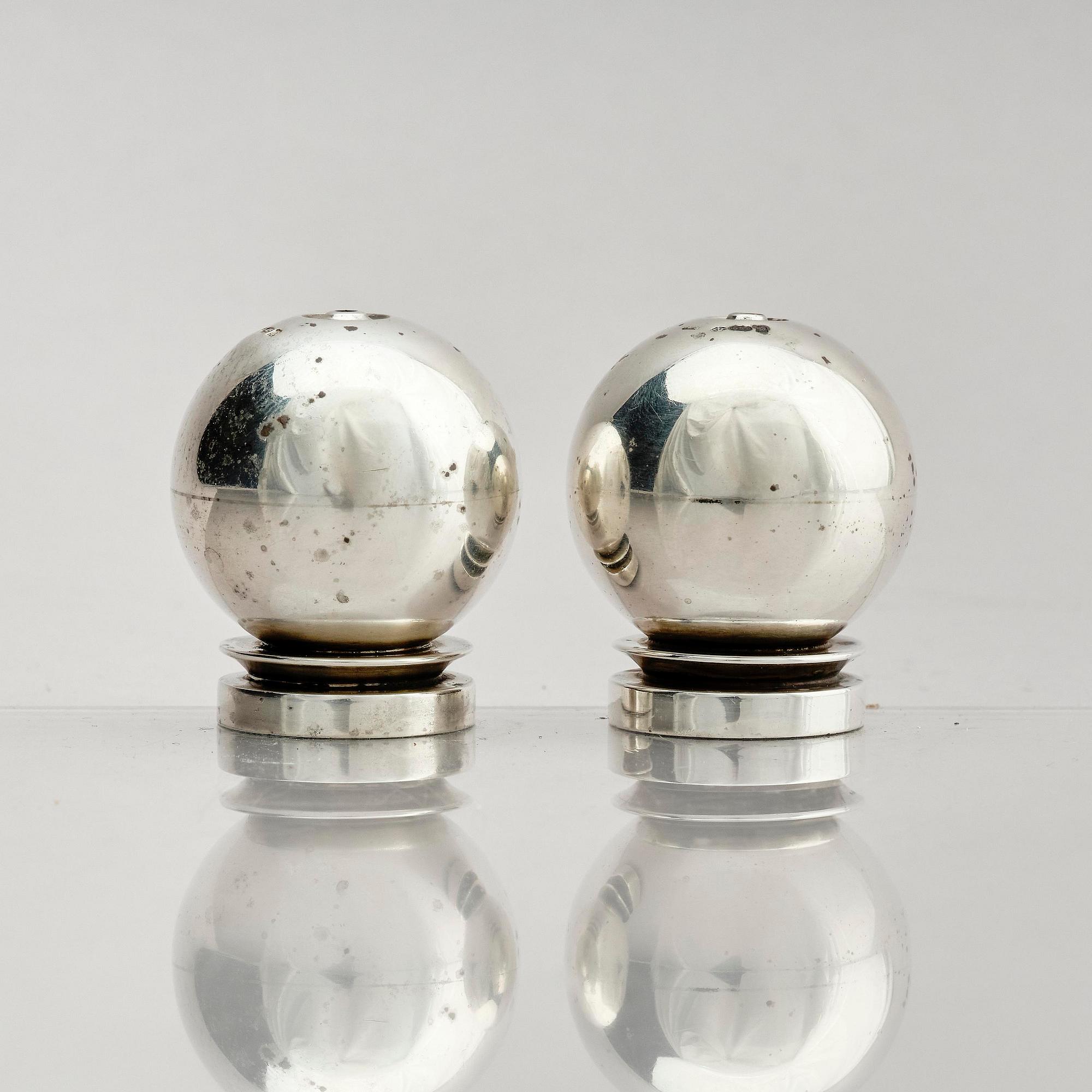 Georg Jensen, a pair of sterling silver salt shakers, model 'Pyramid/ Pyramide', design Harald Nielsen, no 632, Copenhagen after 1945.