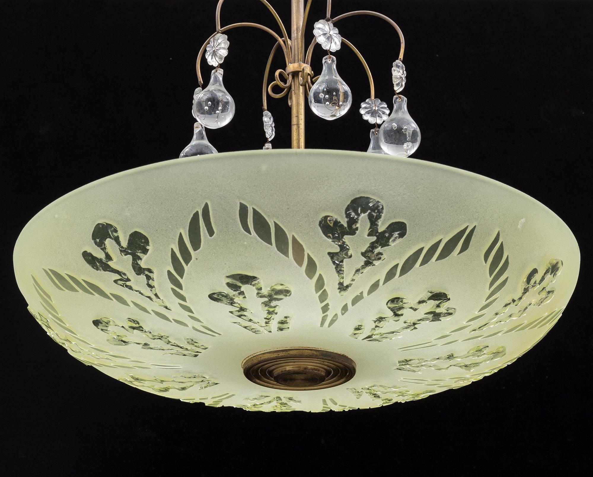 TAKLAMPA, 1900-talets mitt.