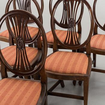 An early 20th century/20th century dining table and chairs, 3+6 pieces.