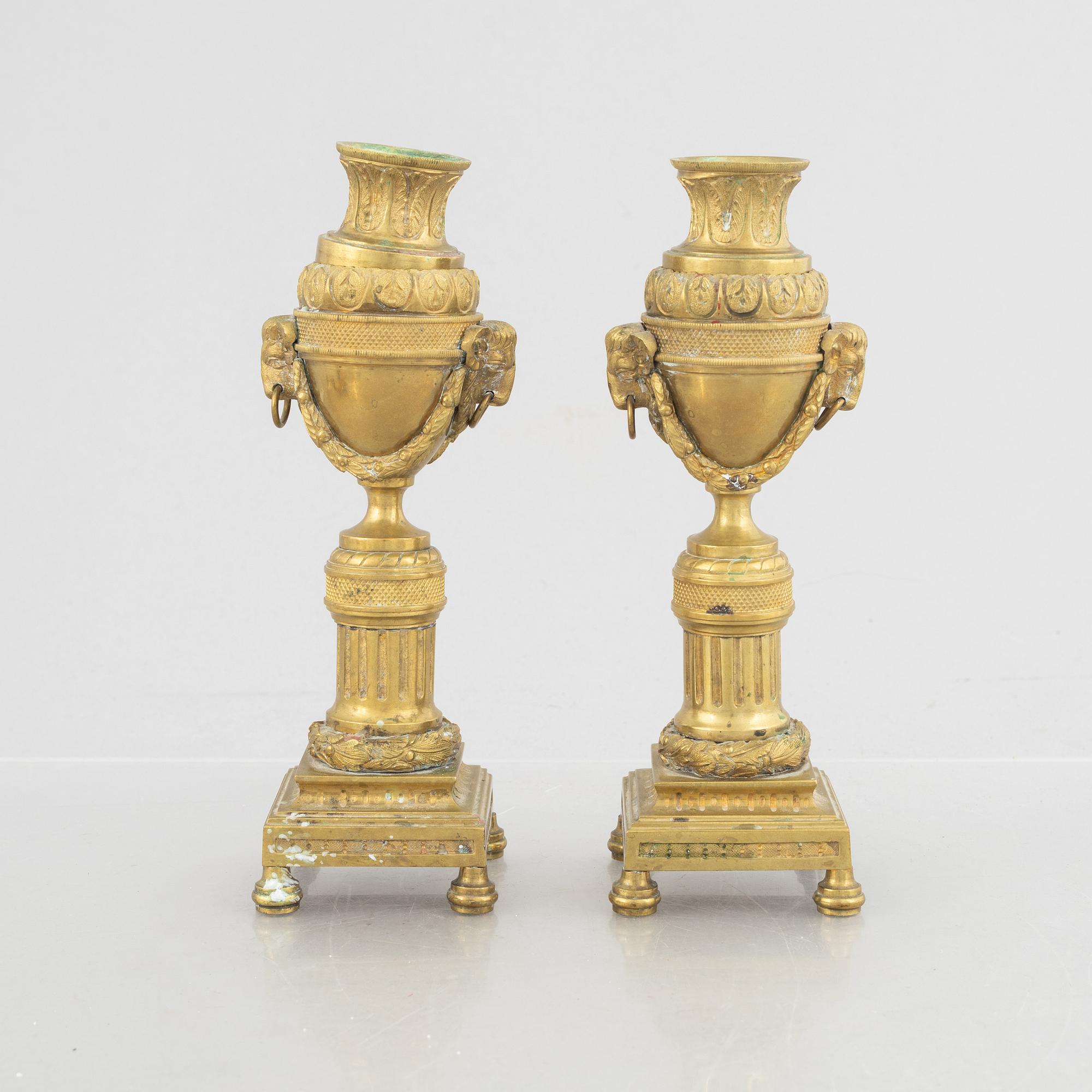 A pair of Louis XVI-style candlesticks, late 19th century.