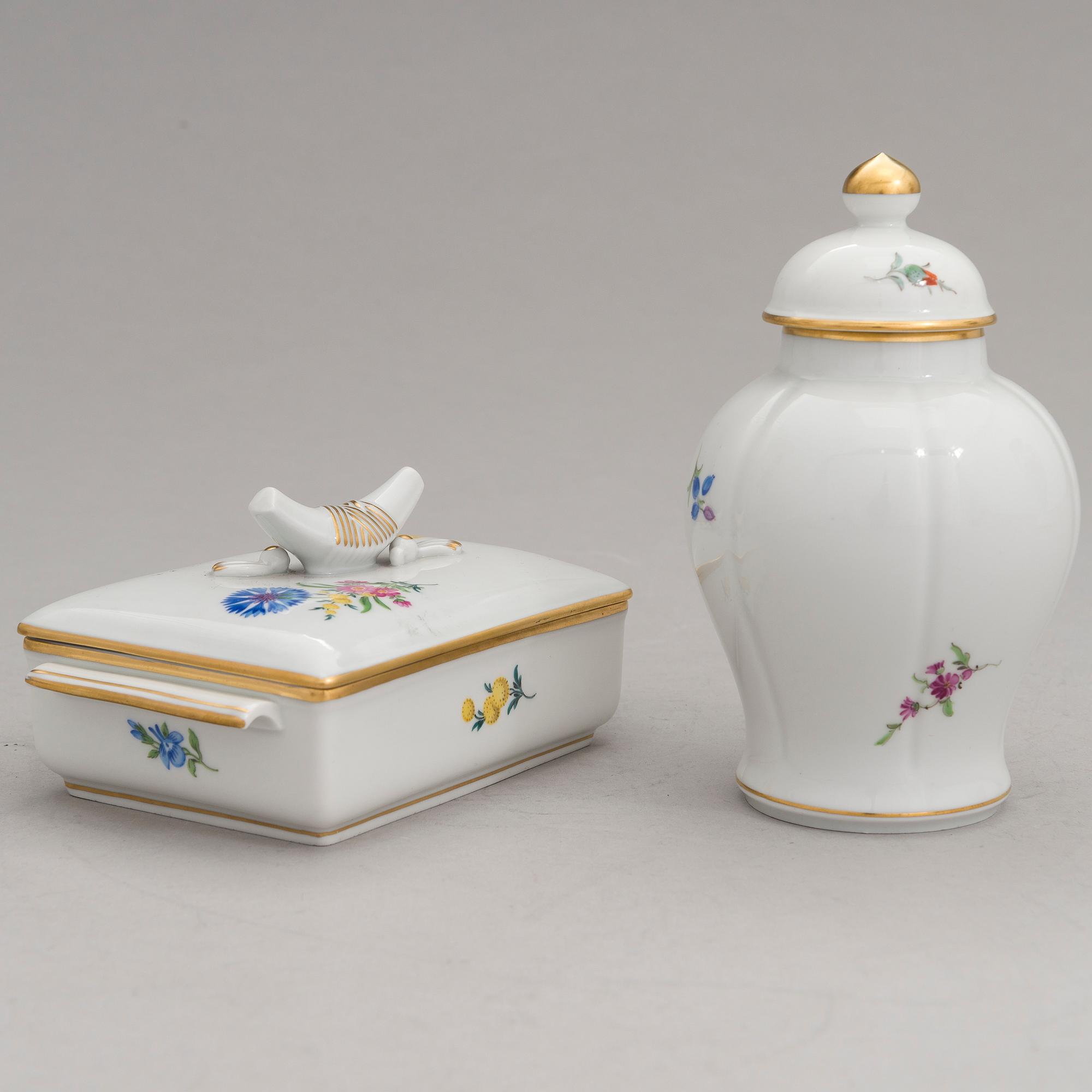 Two Meissen porcelain vases, a platter, an urn and a lidded box from the latter half of 20th century.