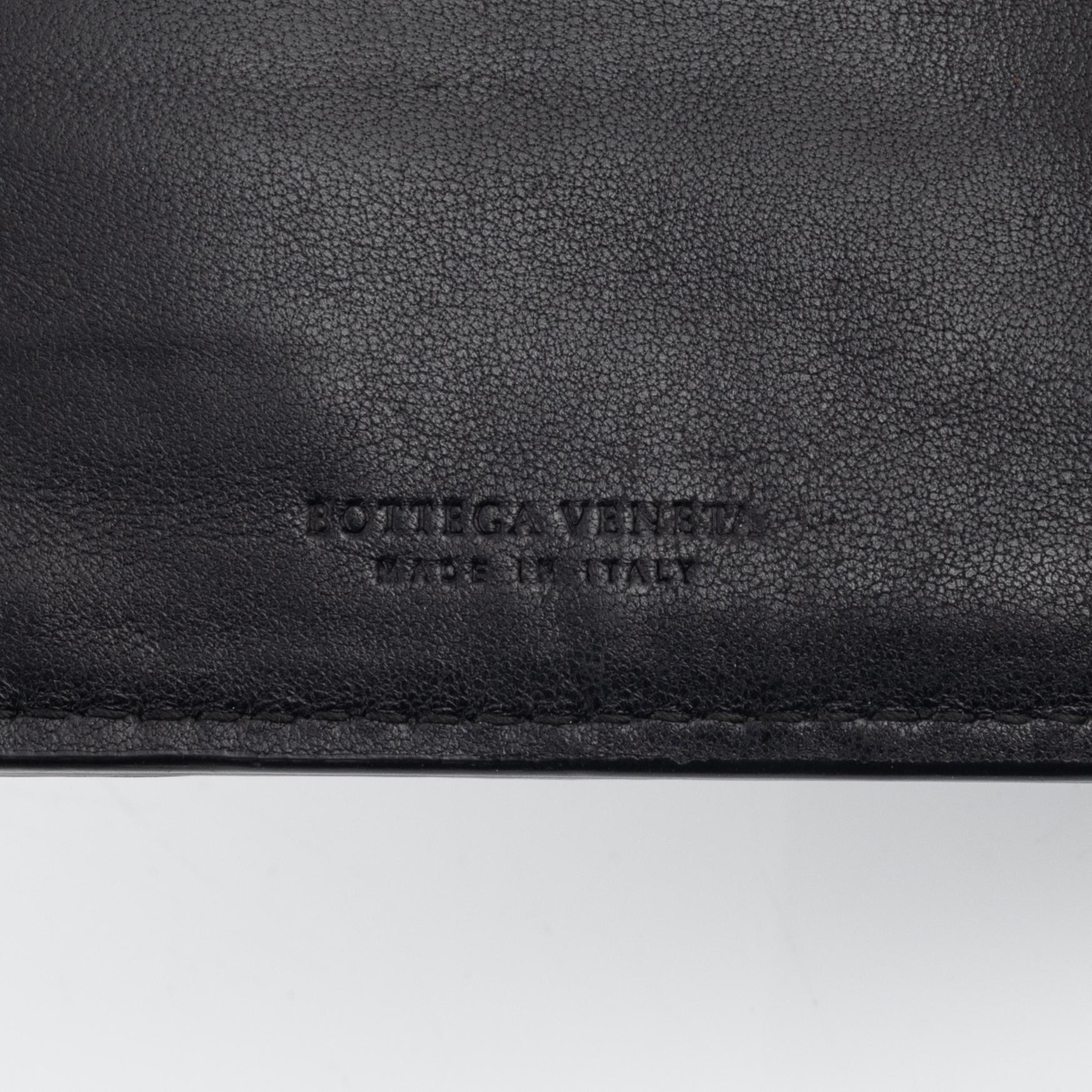 Bottega Veneta, a wallet and bracelet.