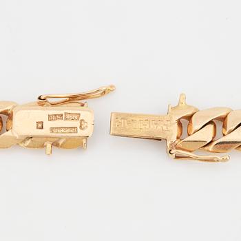 Armband 18K guld manglad pansar.