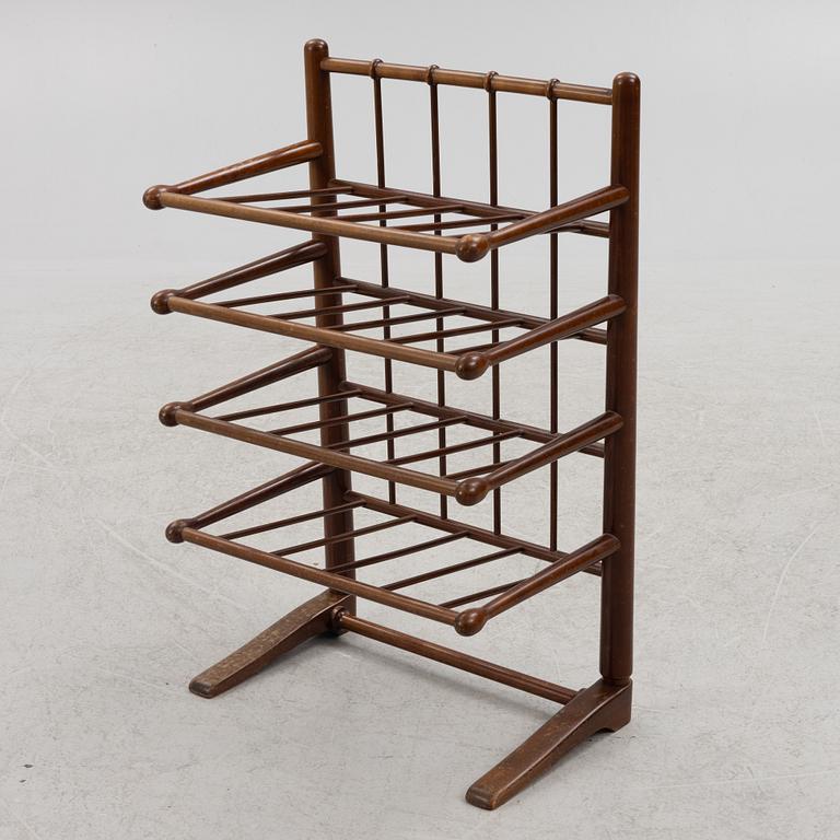 A magazine rack, mid-20th century.