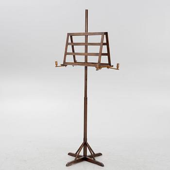 A four-light sheet-music stand, late 19th century.