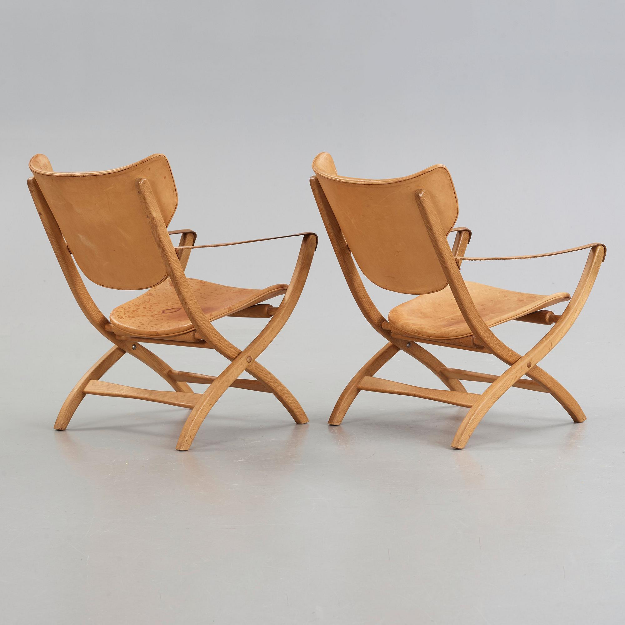 A pair of Poul Hundevad oak Egyptian folding chairs, Vamdrup, Denmark 1950-60's.