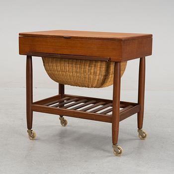 A teak veneered sewing table, 1950's/1960's.