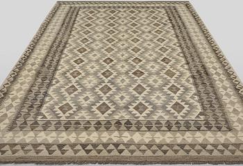 A Kilim rug, approx. 297 x 203 cm.