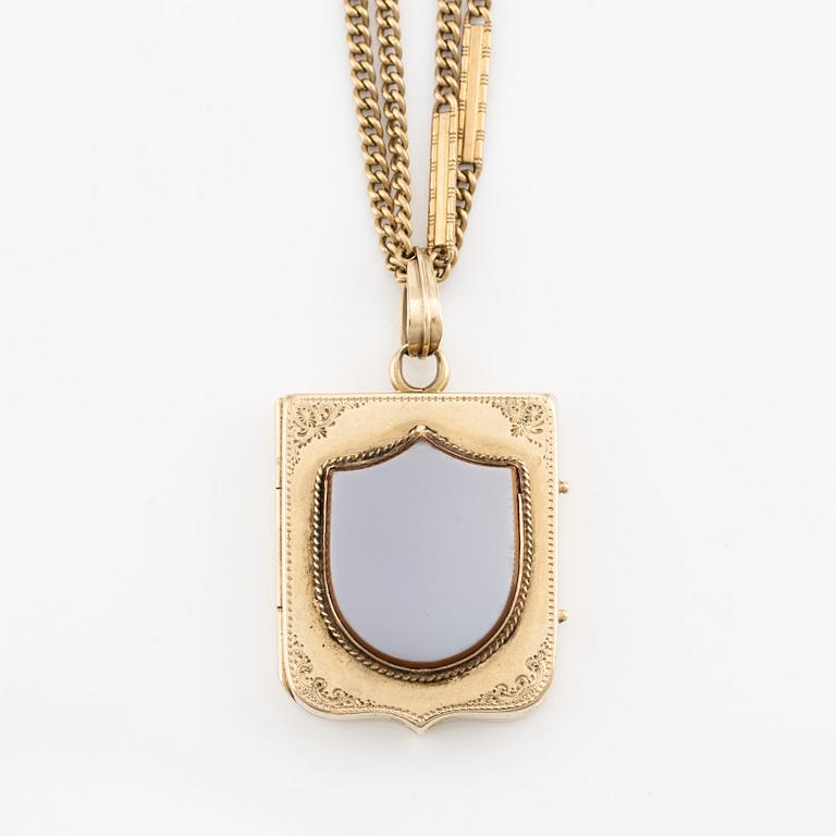 Pendant, locket 14K gold with agate and 18K gold chain.