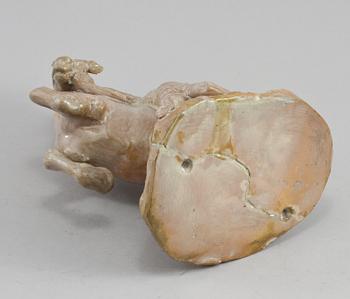 FIGURIN, stengods, signerad KA och och daterad 1921.